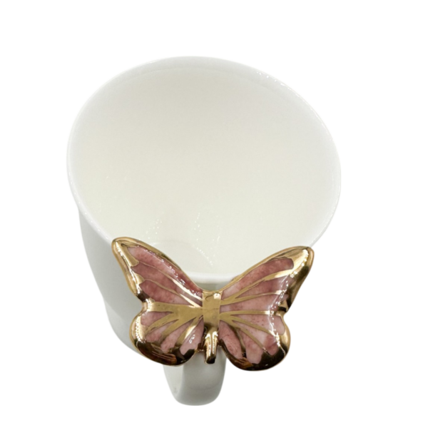 Porcelianinis puodelis su rožiniu drugeliu