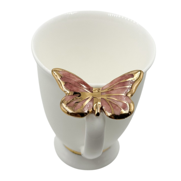 Porcelianinis puodelis su rožiniu drugeliu